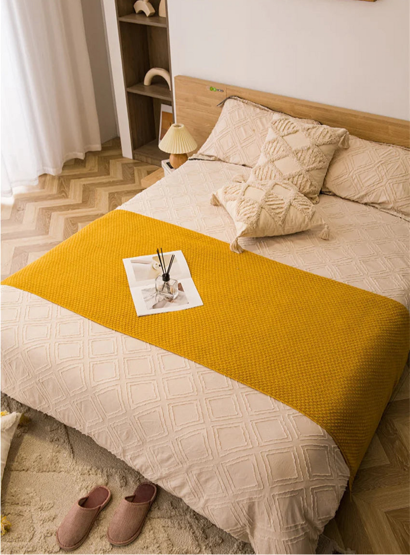 Manta de Malha com Borla - Conforto e Estilo para Seu Lar - Casa Farfelle