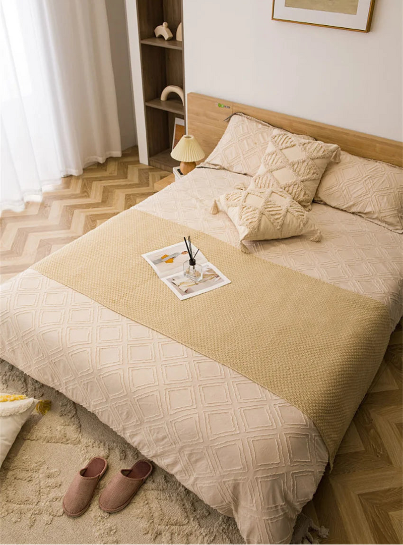 Manta de Malha com Borla - Conforto e Estilo para Seu Lar - Casa Farfelle