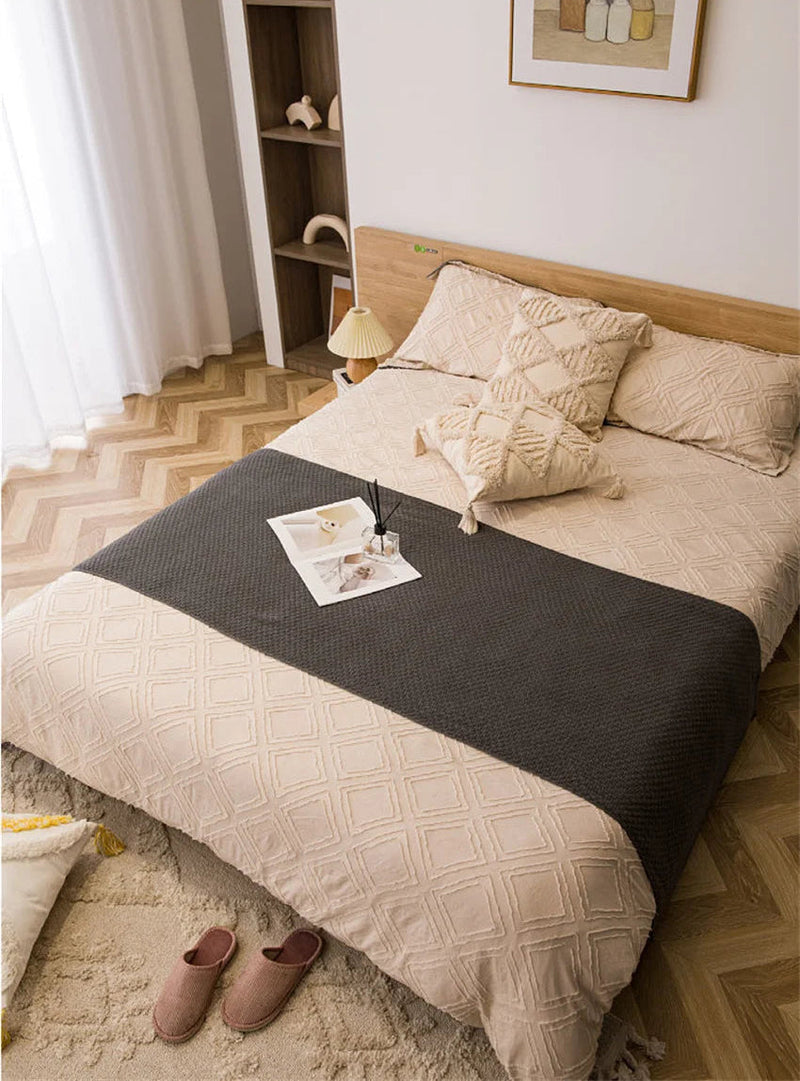 Manta de Malha com Borla - Conforto e Estilo para Seu Lar - Casa Farfelle